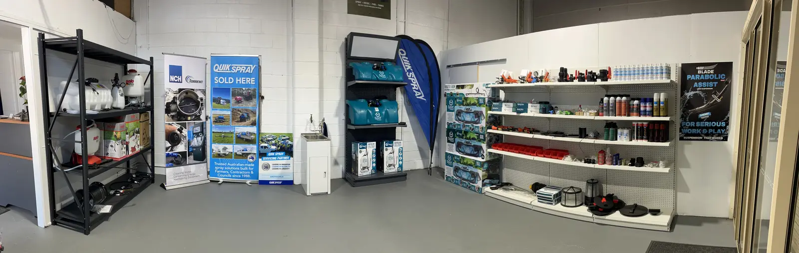 Inside the Spray Equip showroom, with shelves of sprayers, pumps and parts